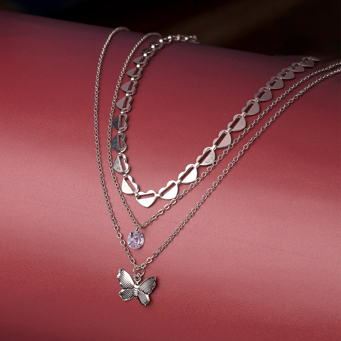 Trendy Three Layered Silver Necklace with Butterfly Pendant , diamonti stone and Chain of Hearts